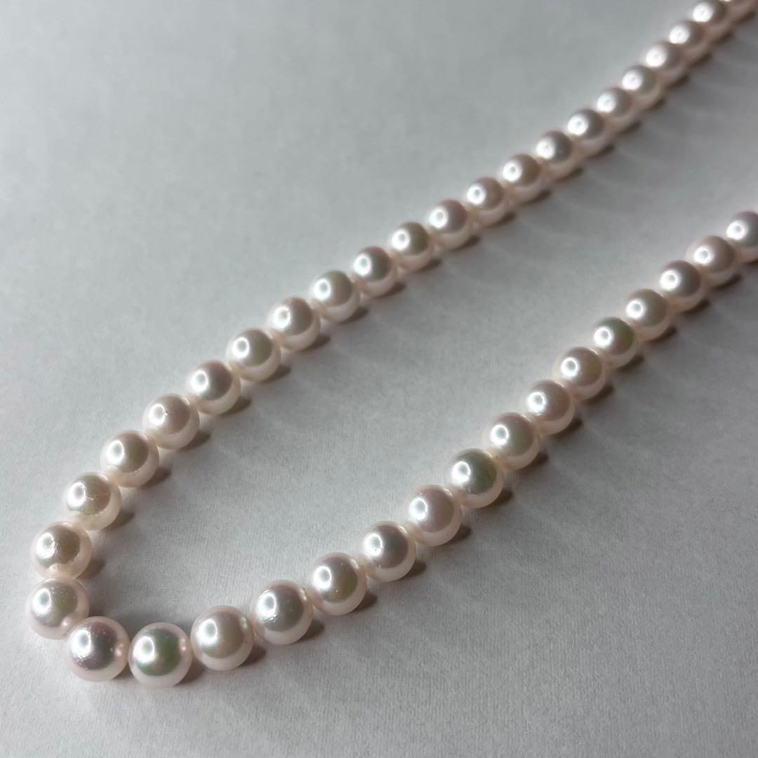 Tasaki Akoya pearl necklace with 6.0-6.5mm white round pearls, 42cm length, silver clasp, all knot style setting