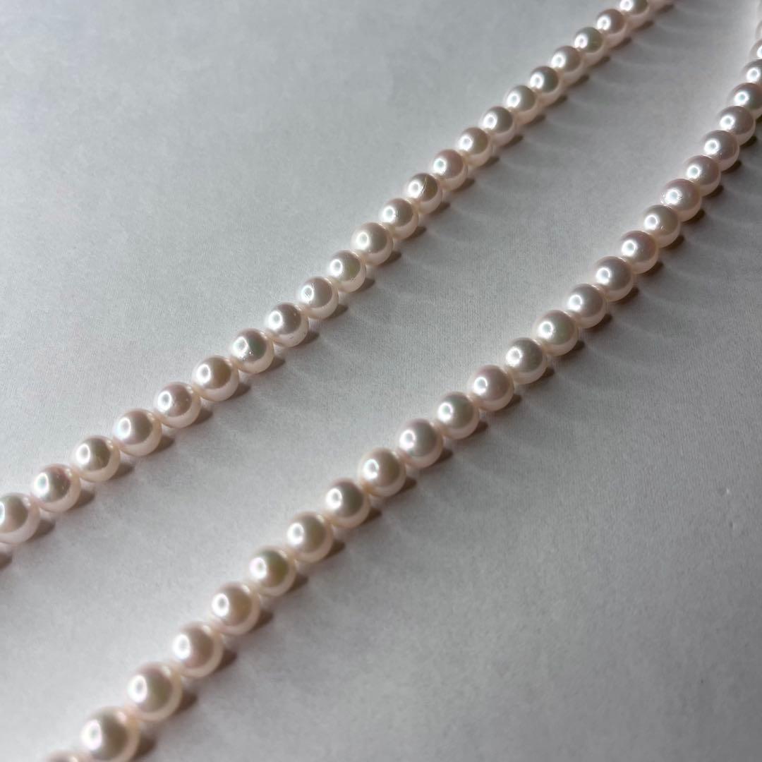 Tasaki Akoya pearl necklace with 6.0-6.5mm white round pearls, 42cm length, silver clasp, all knot style setting