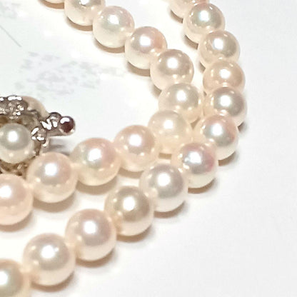 Akoya pearl semi-long necklace approx 64cm with 6-6.5mm white pearls showing slight irregularities and strong luster