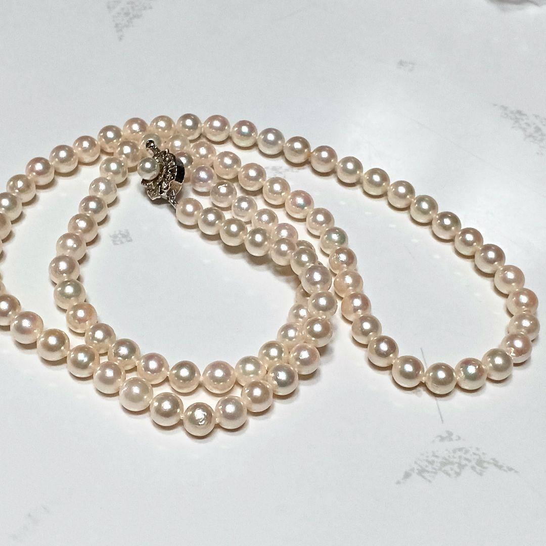 Akoya pearl semi-long necklace approx 64cm with 6-6.5mm white pearls showing slight irregularities and strong luster