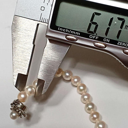 Akoya pearl semi-long necklace approx 64cm with 6-6.5mm white pearls showing slight irregularities and strong luster