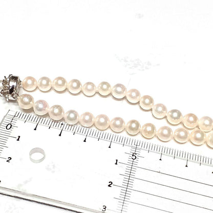 Akoya pearl semi-long necklace approx 64cm with 6-6.5mm white pearls showing slight irregularities and strong luster