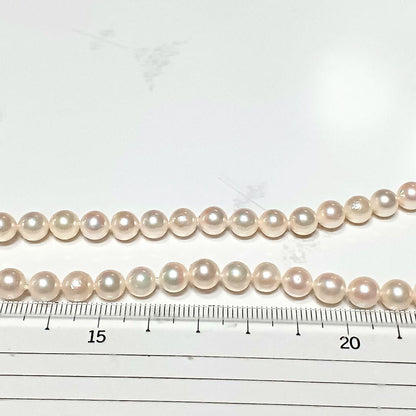 Akoya pearl semi-long necklace approx 64cm with 6-6.5mm white pearls showing slight irregularities and strong luster