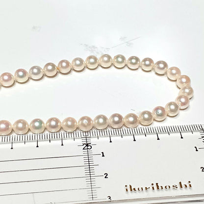 Akoya pearl semi-long necklace approx 64cm with 6-6.5mm white pearls showing slight irregularities and strong luster