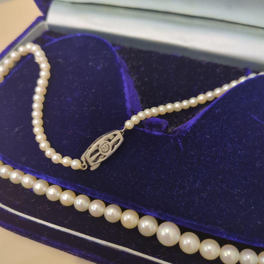 Old Mikimoto genuine pearl necklace with 7mm pearls measuring 38 cm in length