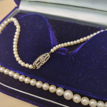 Old Mikimoto genuine pearl necklace with 7mm pearls measuring 38 cm in length