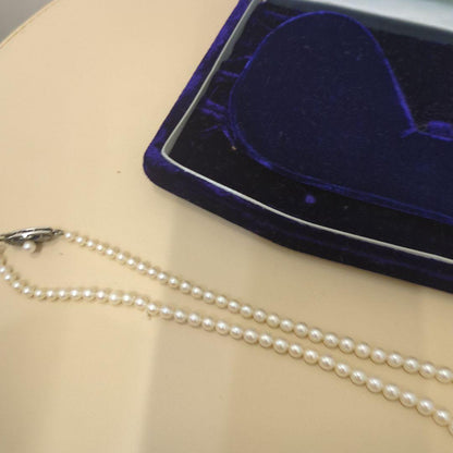 Old Mikimoto genuine pearl necklace with 7mm pearls measuring 38 cm in length
