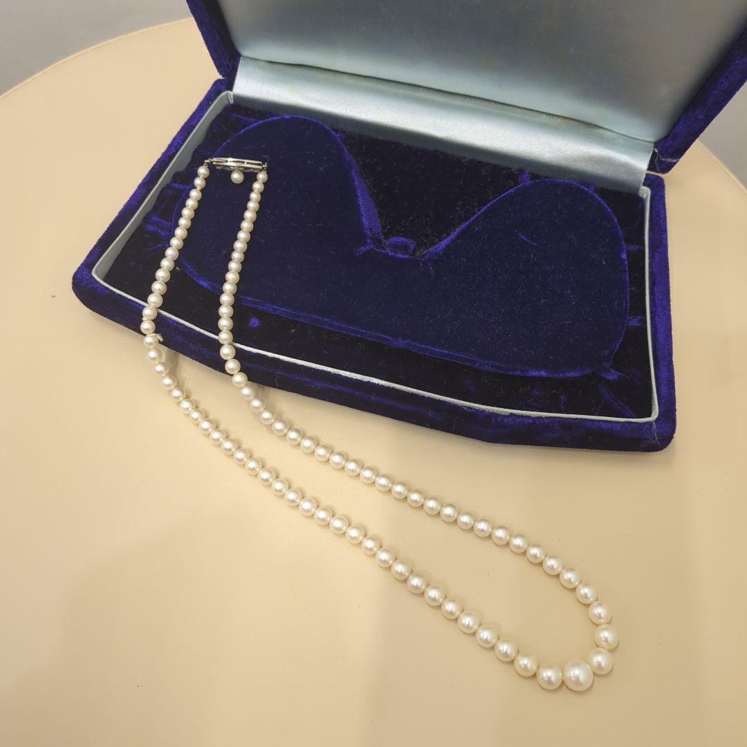 Old Mikimoto genuine pearl necklace with 7mm pearls measuring 38 cm in length