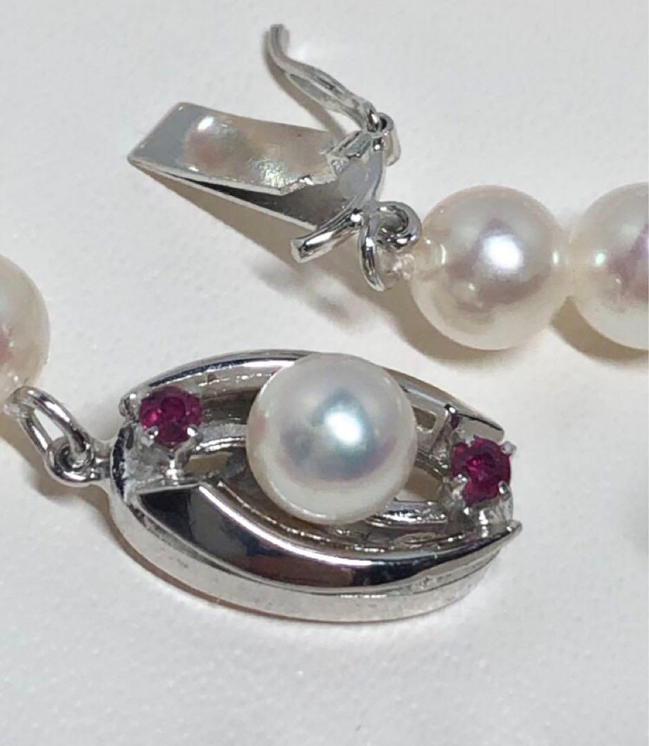 Long Akoya pearl necklace with white round Hanadama pearls measuring 6.0-6.5 mm on K14WG chain