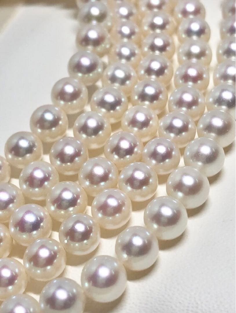 Long Akoya pearl necklace with white round Hanadama pearls measuring 6.0-6.5 mm on K14WG chain