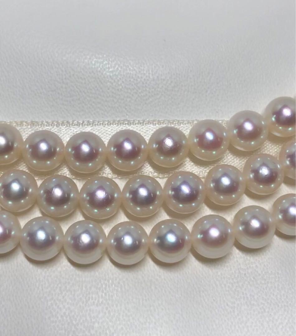 Long Akoya pearl necklace with white round Hanadama pearls measuring 6.0-6.5 mm on K14WG chain