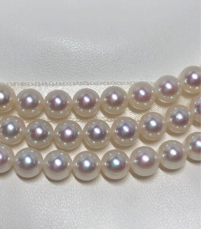Long Akoya pearl necklace with white round Hanadama pearls measuring 6.0-6.5 mm on K14WG chain
