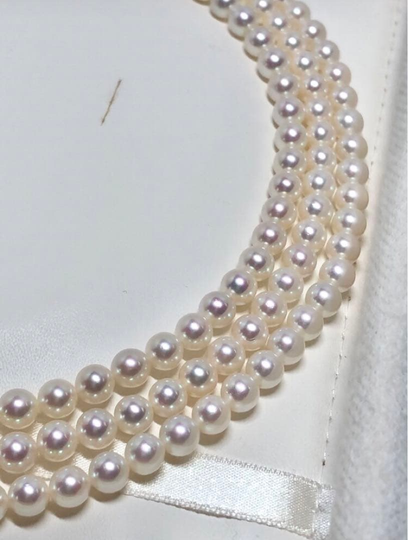 Long Akoya pearl necklace with white round Hanadama pearls measuring 6.0-6.5 mm on K14WG chain