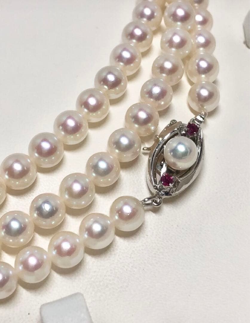 Long Akoya pearl necklace with white round Hanadama pearls measuring 6.0-6.5 mm on K14WG chain