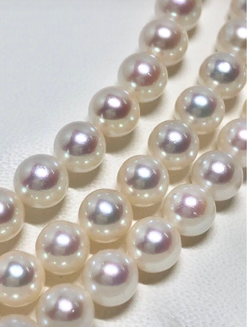 Long Akoya pearl necklace with white round Hanadama pearls measuring 6.0-6.5 mm on K14WG chain
