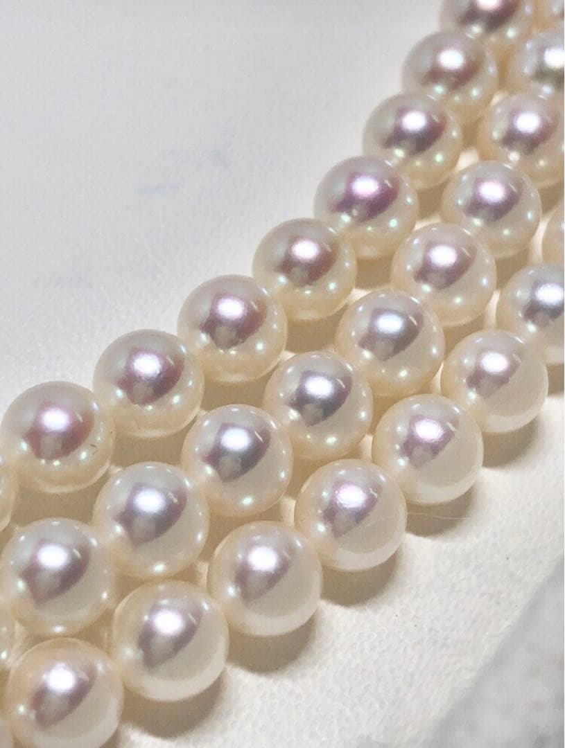 Long Akoya pearl necklace with white round Hanadama pearls measuring 6.0-6.5 mm on K14WG chain