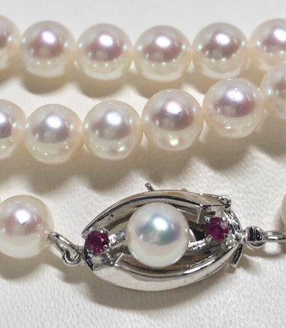 Long Akoya pearl necklace with white round Hanadama pearls measuring 6.0-6.5 mm on K14WG chain