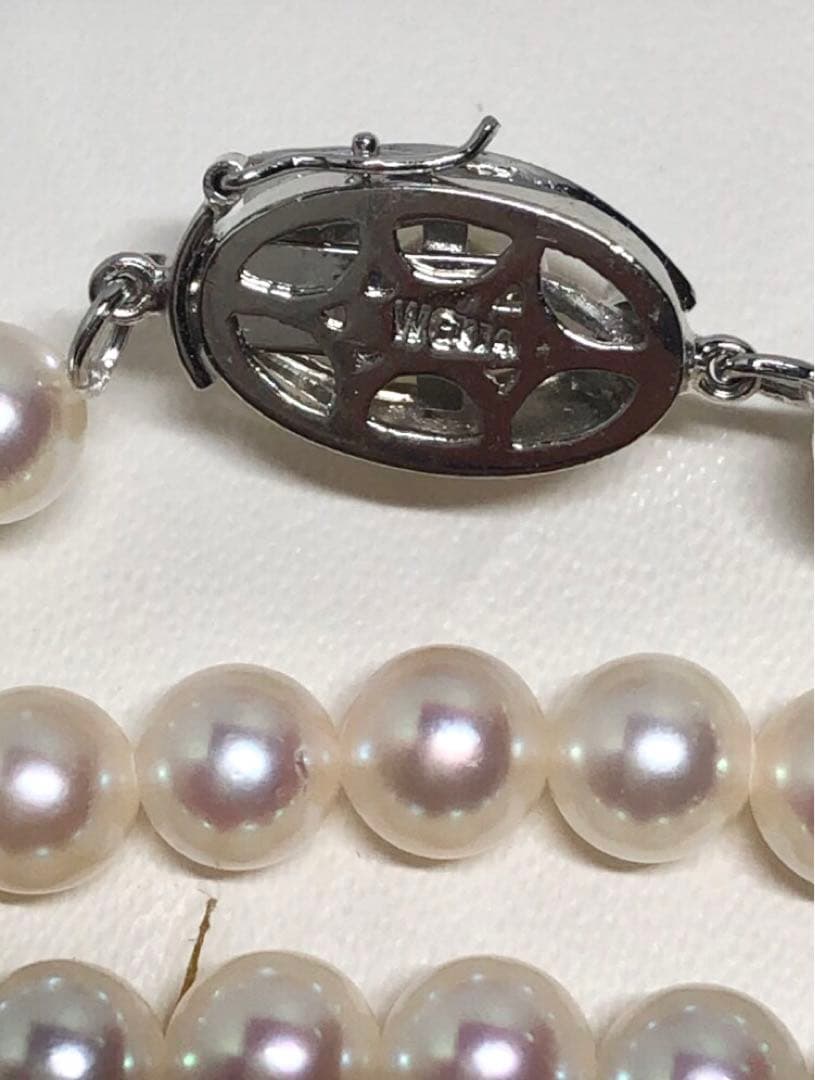 Long Akoya pearl necklace with white round Hanadama pearls measuring 6.0-6.5 mm on K14WG chain