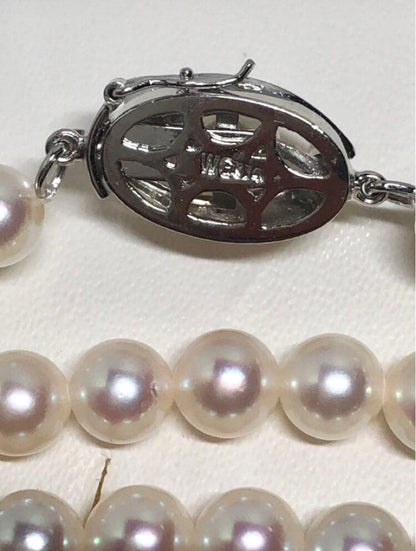 Long Akoya pearl necklace with white round Hanadama pearls measuring 6.0-6.5 mm on K14WG chain
