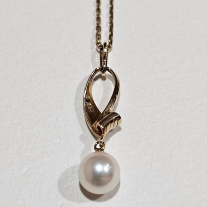 Mikimoto vintage 7mm pearl necklace in 14K yellow gold with 40cm chain from 1970s-1980s
