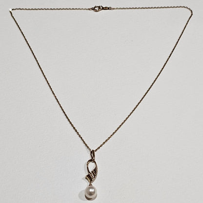 Mikimoto vintage 7mm pearl necklace in 14K yellow gold with 40cm chain from 1970s-1980s