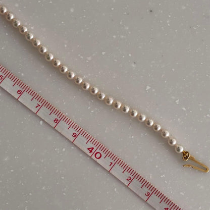 MIKIMOTO Baby Pearl Necklace with 4.0-4.4mm Akoya pearls, 43cm length, K18 yellow gold clasp and diamond pendant
