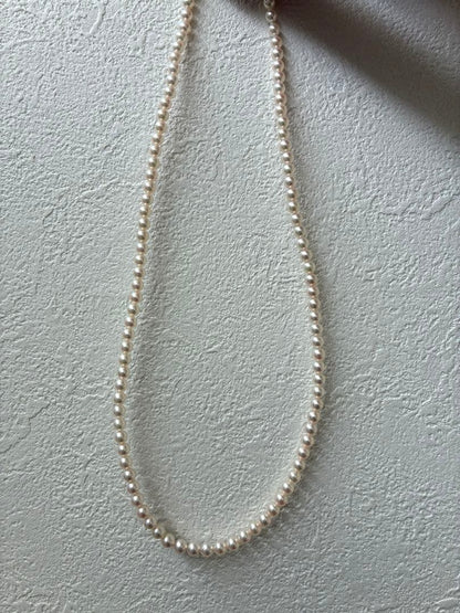 MIKIMOTO Baby Pearl Necklace with 4.0-4.4mm Akoya pearls, 43cm length, K18 yellow gold clasp and diamond pendant