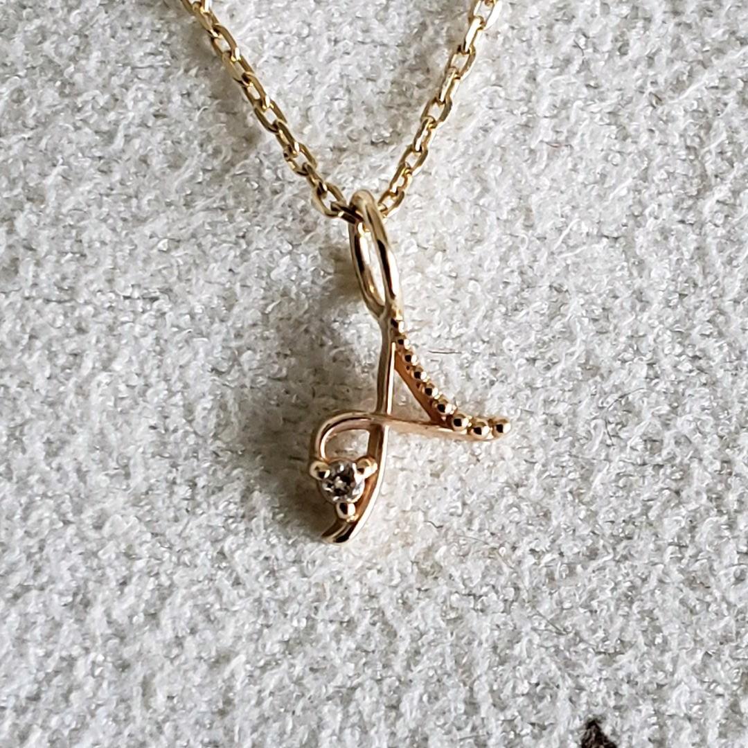 Gold K10 initial necklace with diamond letter A pendant and adjustable chain