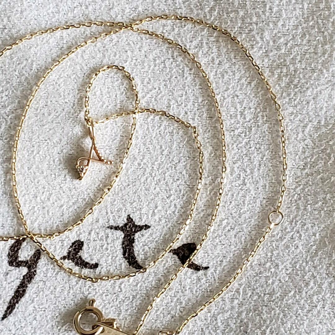 Gold K10 initial necklace with diamond letter A pendant and adjustable chain