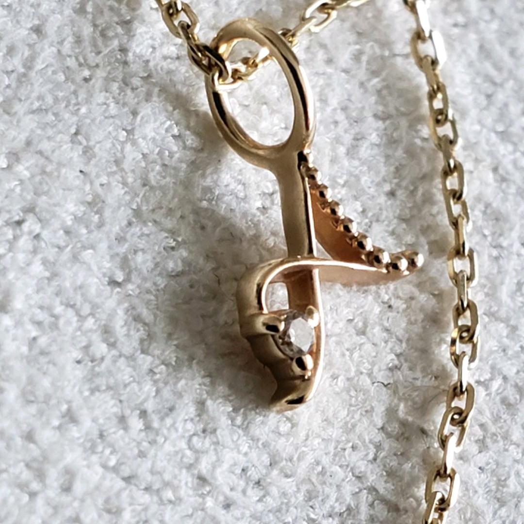 Gold K10 initial necklace with diamond letter A pendant and adjustable chain