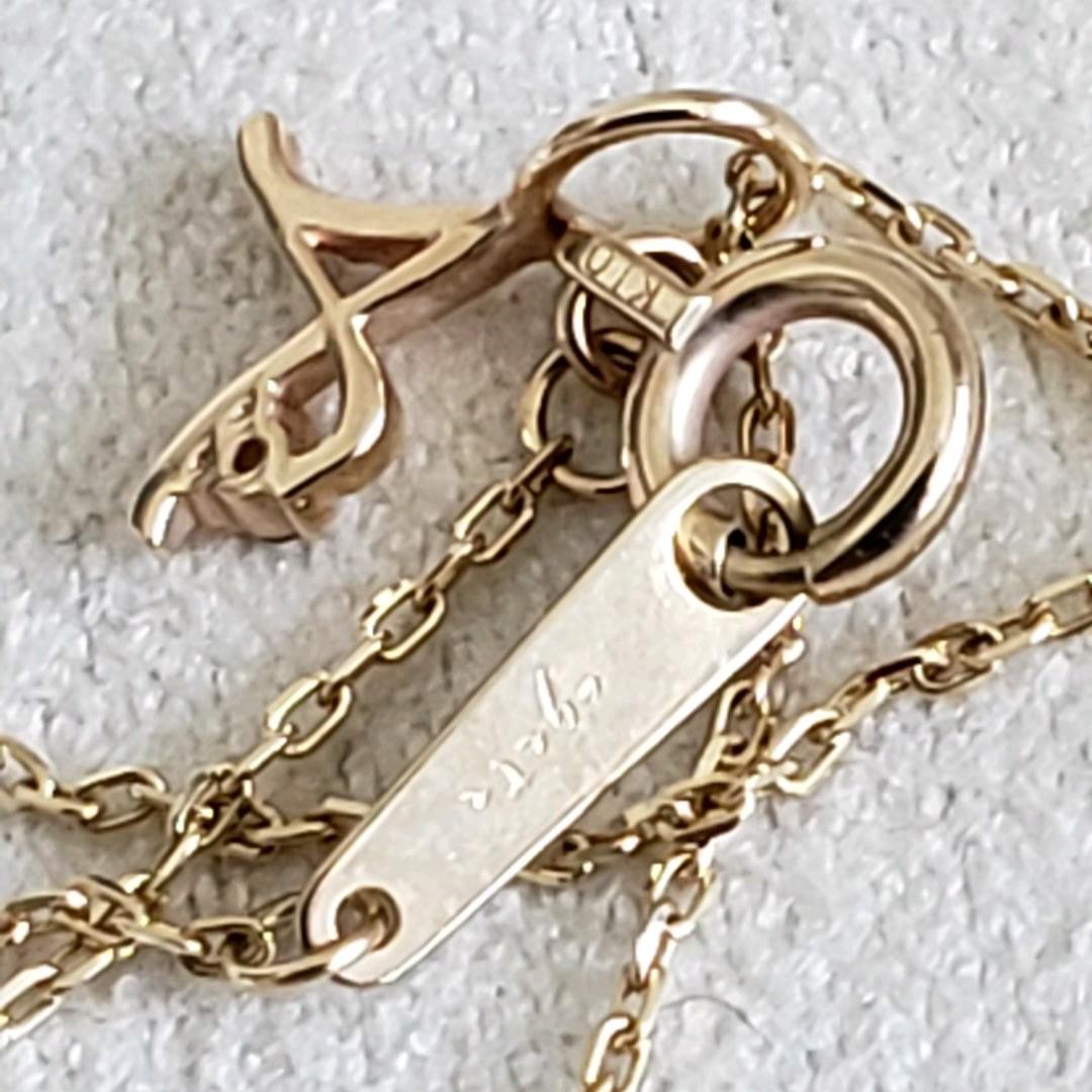 Gold K10 initial necklace with diamond letter A pendant and adjustable chain