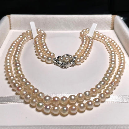 Two-strand Hanadama Akoya pearl necklace with 6.3-7.0mm round white pearls and sterling silver clasp