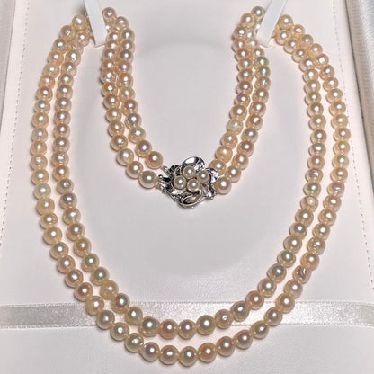 Two-strand Hanadama Akoya pearl necklace with 6.3-7.0mm round white pearls and sterling silver clasp