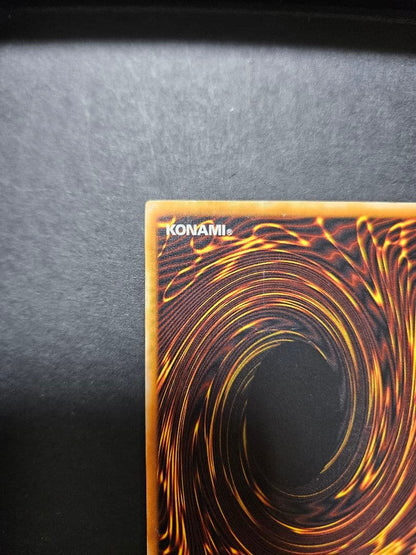 Yu-Gi-Oh Black Magician Leaf Relief card with visible vertical and horizontal folds