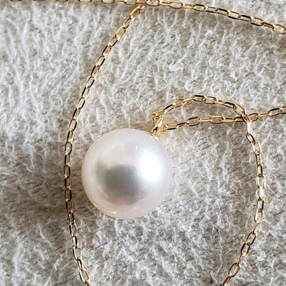 Oyster pearl necklace featuring 7mm Akoya pearls with a 36-40 cm adjustable K18 gold chain