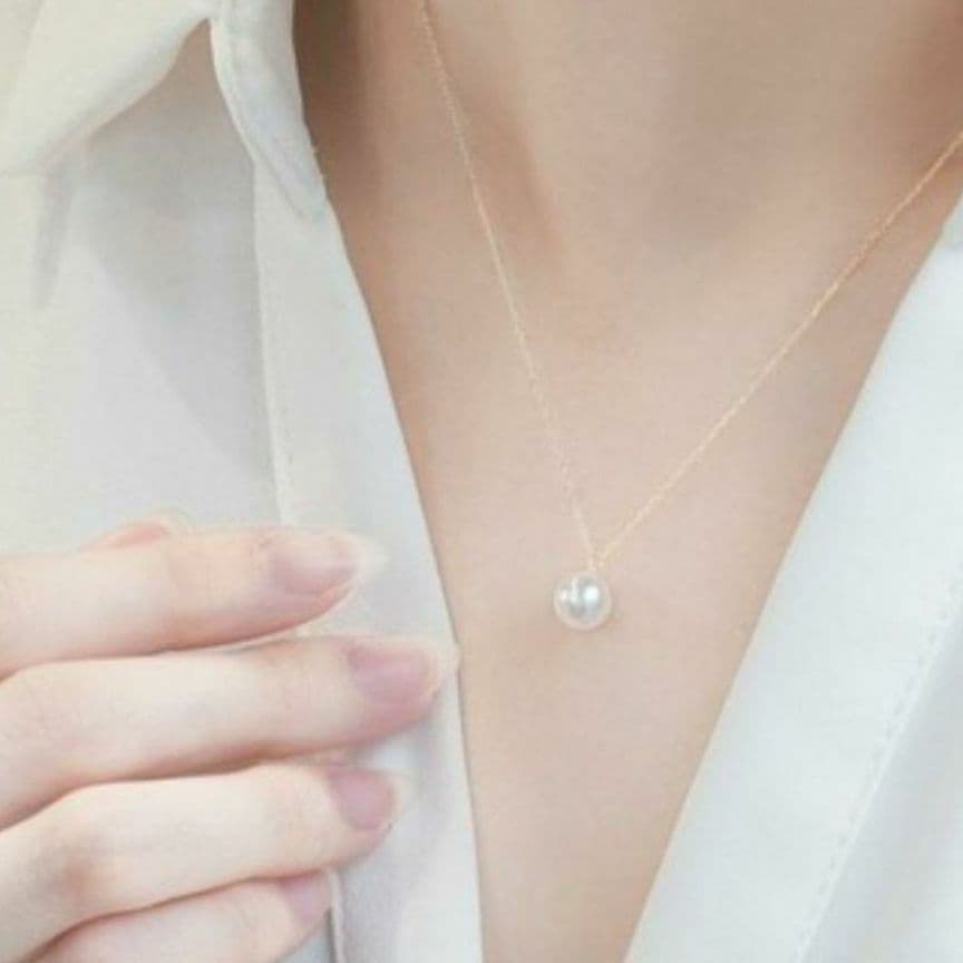 Oyster pearl necklace featuring 7mm Akoya pearls with a 36-40 cm adjustable K18 gold chain