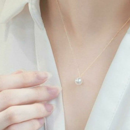 Oyster pearl necklace featuring 7mm Akoya pearls with a 36-40 cm adjustable K18 gold chain