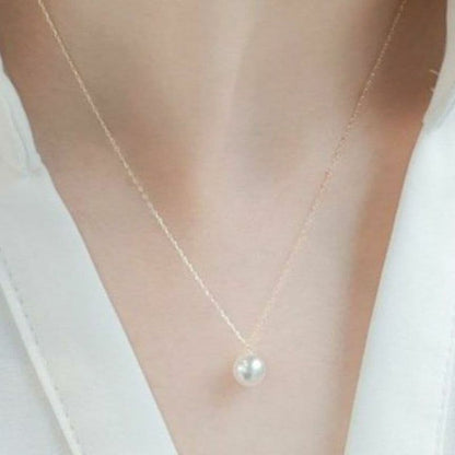 Oyster pearl necklace featuring 7mm Akoya pearls with a 36-40 cm adjustable K18 gold chain