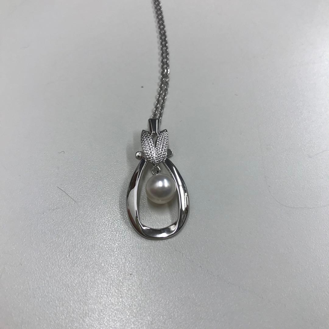 Mikimoto silver pearl necklace featuring 6.8mm round pearls on a silver chain