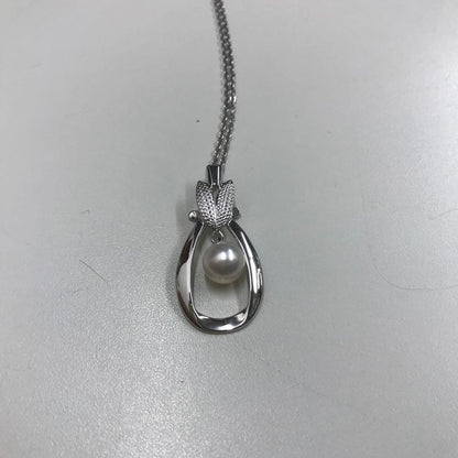 Mikimoto silver pearl necklace featuring 6.8mm round pearls on a silver chain