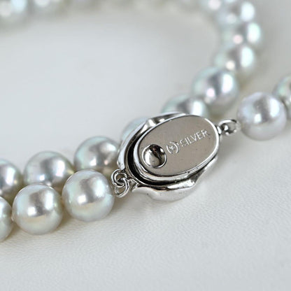 Takashi Akoya pearl necklace with 7.5mm round gray pearls on a 42cm chain