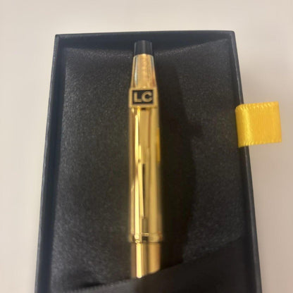 Luxury Card Cross gold ballpoint pen with LC logo on a white background