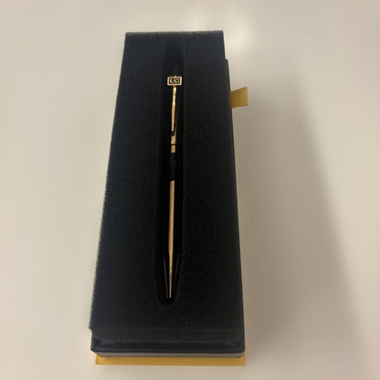 Luxury Card Cross gold ballpoint pen with LC logo on a white background