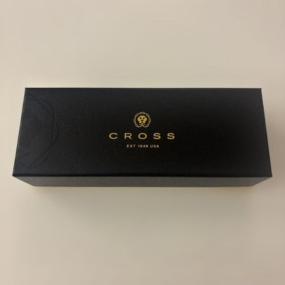 Luxury Card Cross gold ballpoint pen with LC logo on a white background