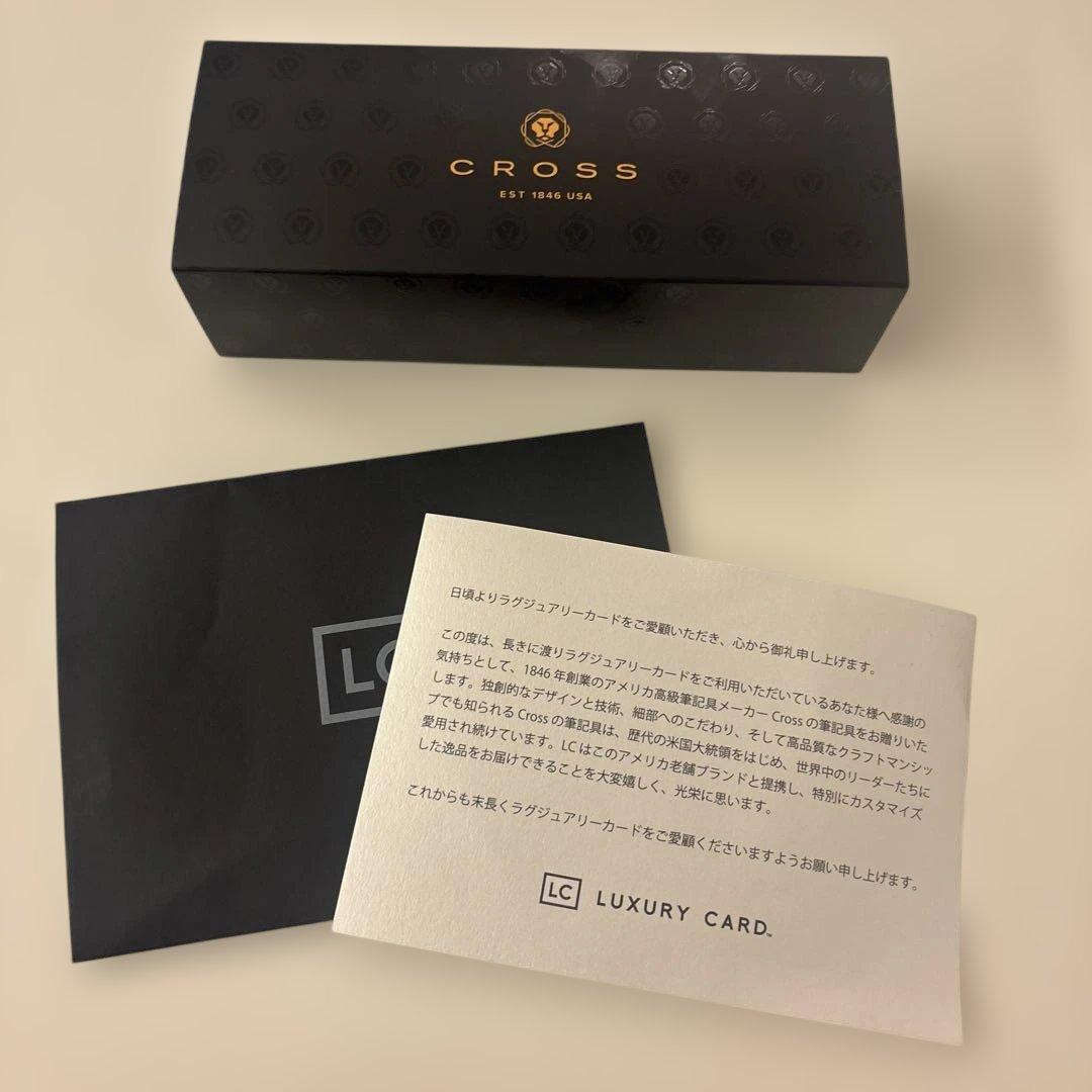 Luxury Card Cross gold ballpoint pen with LC logo on a white background