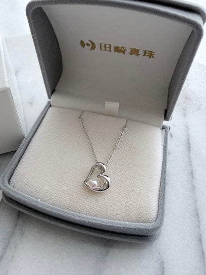 TASAKI Pearl Heart Pendant made of Silver925 with 3.5mm pearl on a white background