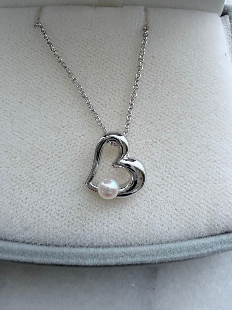 TASAKI Pearl Heart Pendant made of Silver925 with 3.5mm pearl on a white background