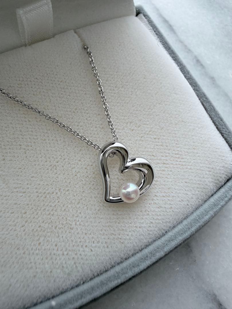 TASAKI Pearl Heart Pendant made of Silver925 with 3.5mm pearl on a white background