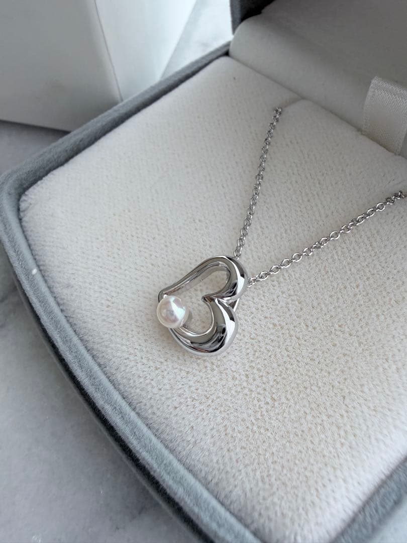 TASAKI Pearl Heart Pendant made of Silver925 with 3.5mm pearl on a white background