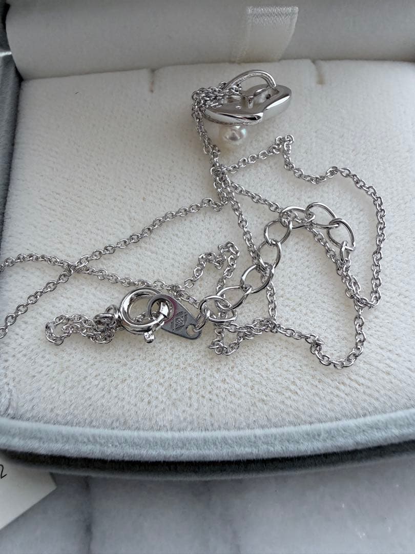 TASAKI Pearl Heart Pendant made of Silver925 with 3.5mm pearl on a white background